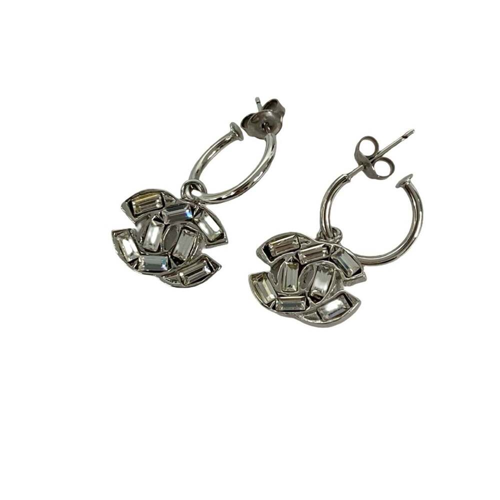 CHANEL Silver Logo Earrings - Picture 3 of 4